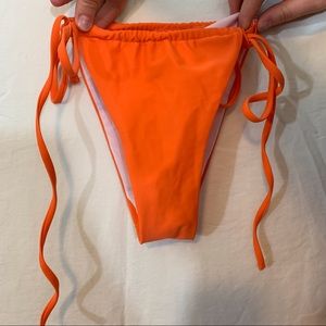 Orange Shein swimsuit bottom.